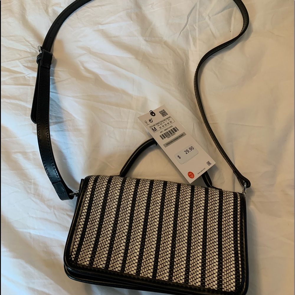 Black, White, and Tan purse
